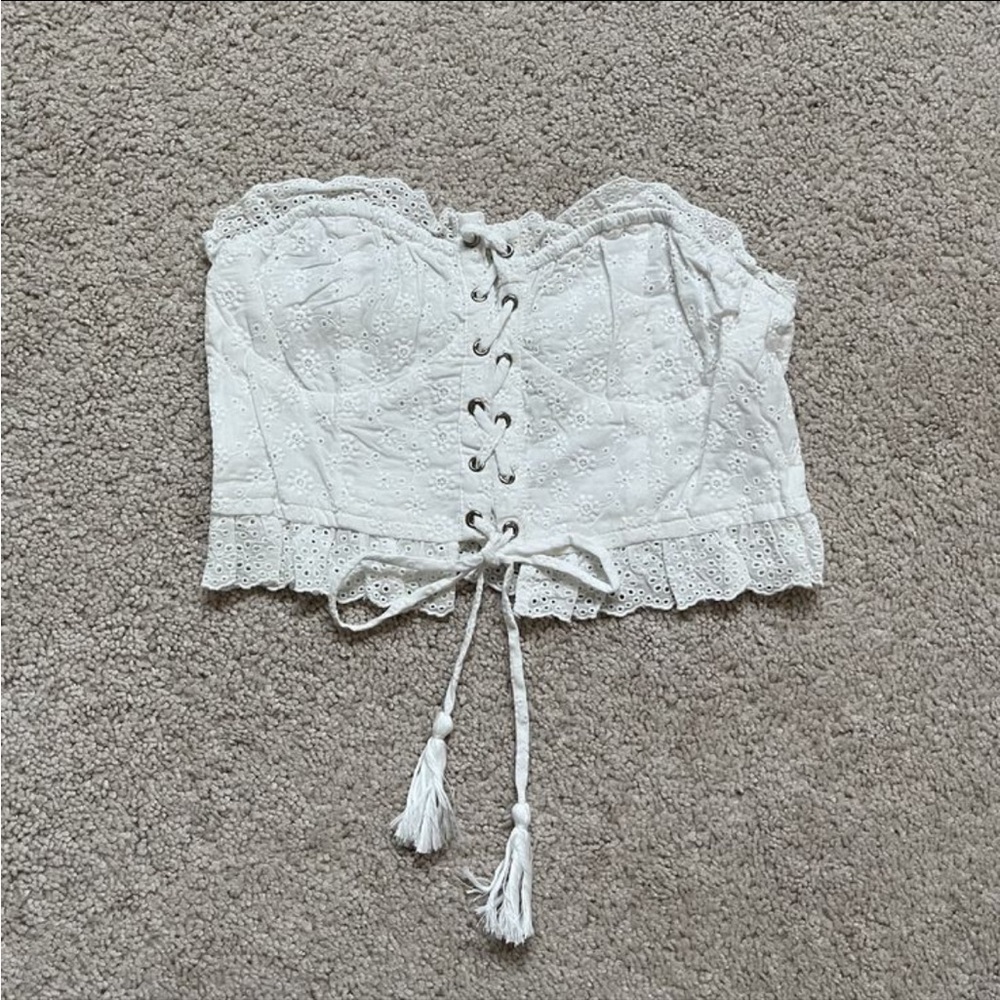 These Three Boutique strapless eyelet top